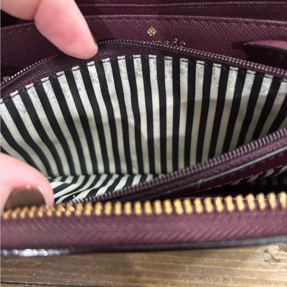 Kate Spade Cameron Street Perforated Rose Lacey Wallet in Deep Plum